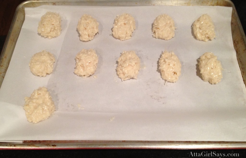 coconut cream egg filling on a parchment lined baking sheet
