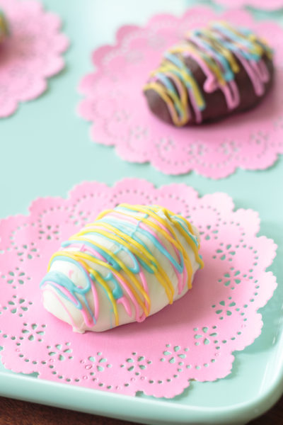 chocolate covered easter eggs drizzled with candy melts