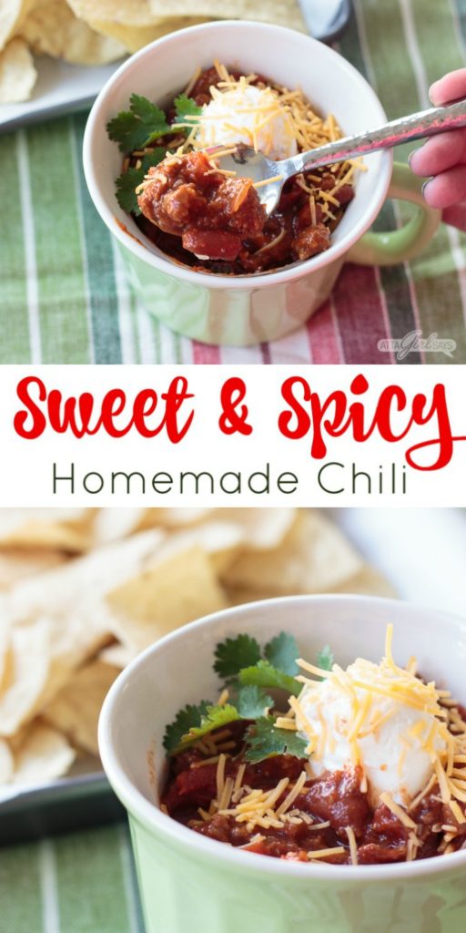 bowl of chili topped with sour cream and cheese