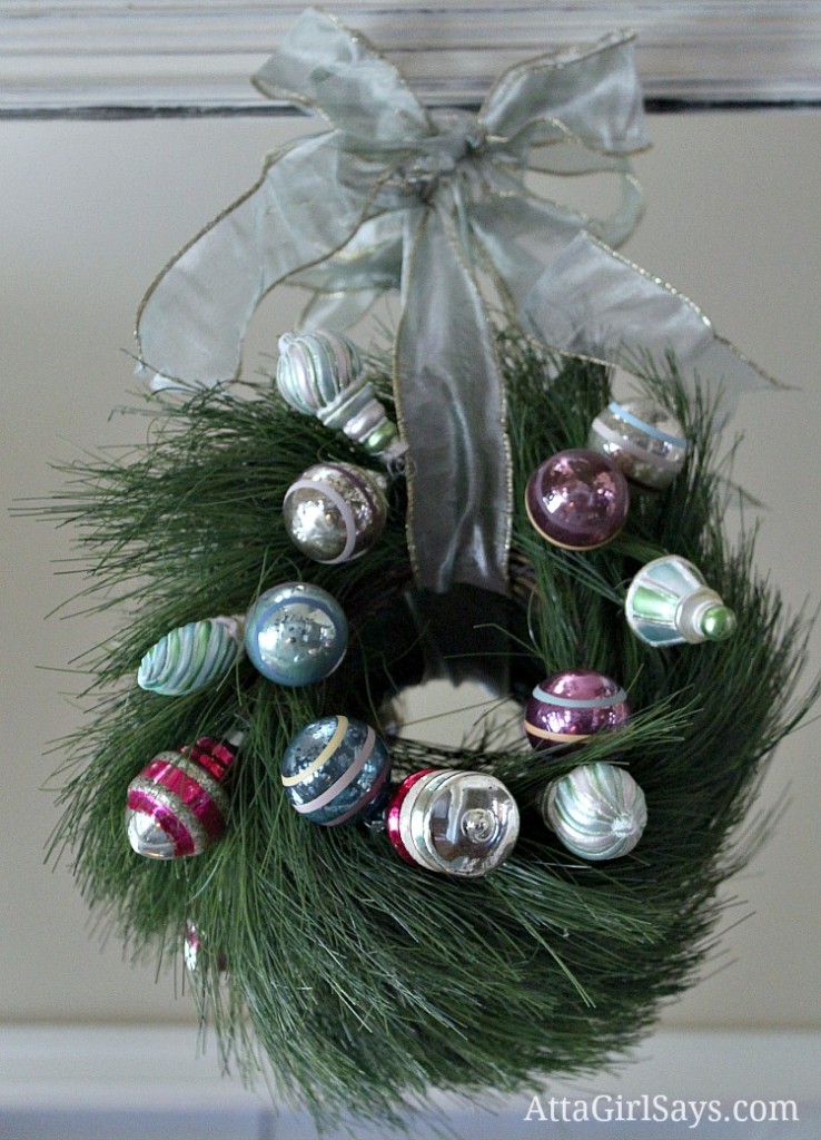 vintage ornament Christmas wreath in pink and green and blue