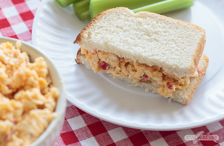 pimento cheese sandwich of a white paper plate