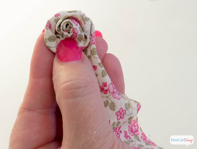How to Make a Rolled Fabric Flower - Click for a full tutorial at AttaGirlSays.com