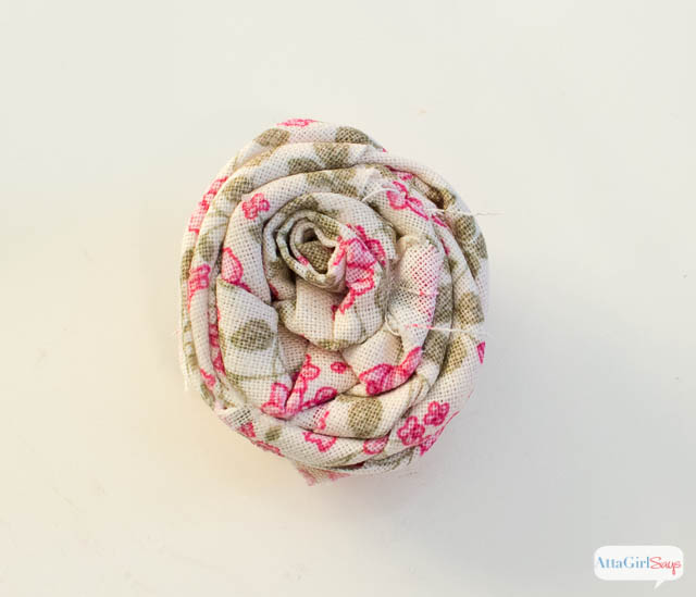 How to Make a Rolled Fabric Flower - Click for a full tutorial at AttaGirlSays.com