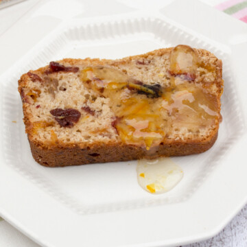 slice of fruit bread on a white plate