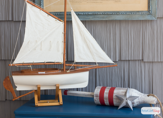 This chest would be perfect at a beach house or in a child's  room decorated with vintage nautical decor. The color on this piece is amazing! Click over for the full tutorial on how to transform a cheap yard sale piece of furniture into a custom piece.