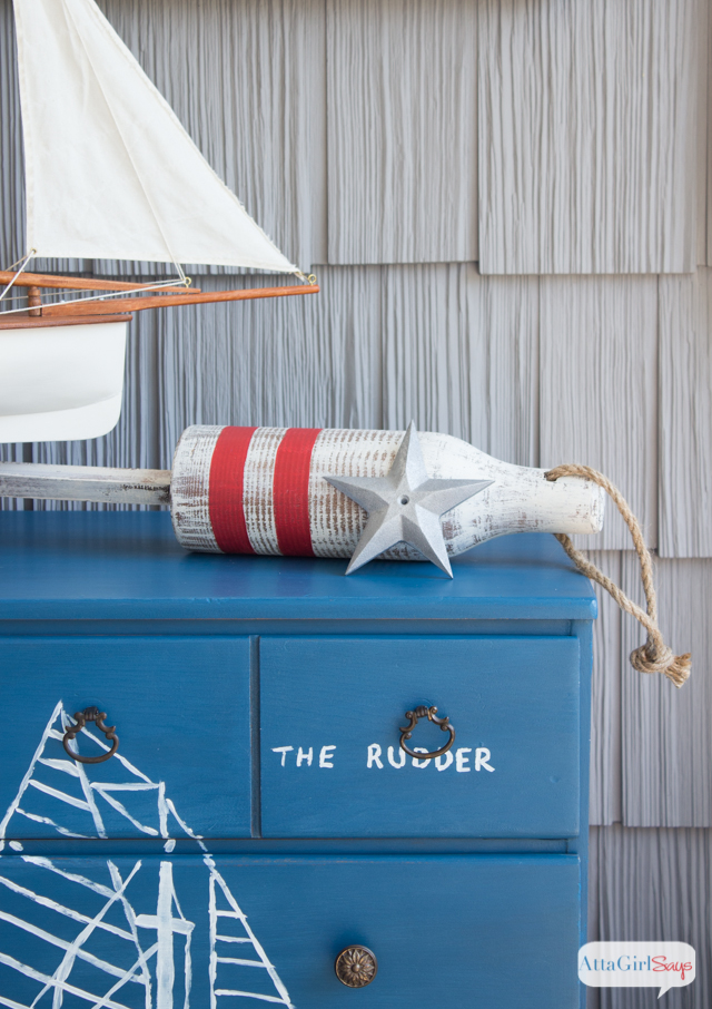 This chest would be perfect at a beach house or in a child's  room decorated with vintage nautical decor. The color on this piece is amazing! Click over for the full tutorial on how to transform a cheap yard sale piece of furniture into a custom piece.