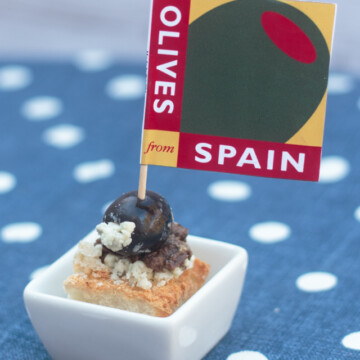 appetizer with blue cheese and olive tapenade on bread