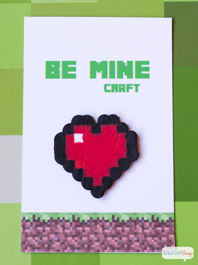 Know a kid who is Minecraft obsessed? They'll love these simple, free printable Minecraft Valentines. Click here to print your own. Add a Perler bead heart to make them even better!