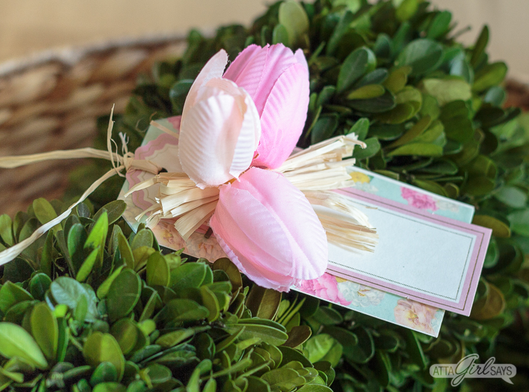 handmade spring gift tag with tulips sitting on top of a preserved boxwood ball