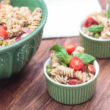 pesto pasta salad in green bowls