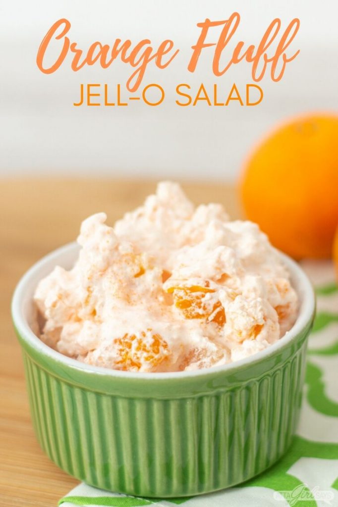 bowl of JELL-O orange salad on a green and white napkin