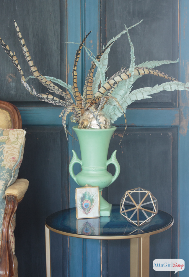 What a gorgeous space! I love the vibrant colors, the mix of vintage and modern elements and the use of different patterns, textures and natural elements. Lots of great living room decorating ideas.