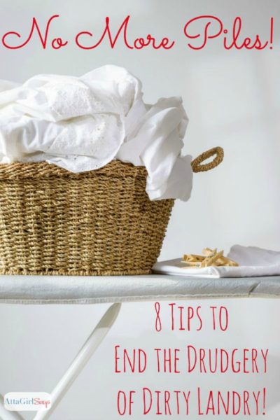 laundry basket filled with sheets on an ironing board