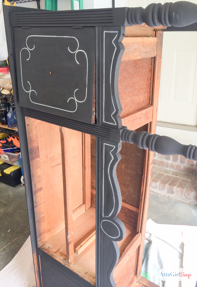 I always worry about painting furniture black because I'm afraid details will get lost. But this vintage buffet is gorgeous. I love the subtle distressing and the white highlights. It really gives new life to a battered, old piece of furniture. #sponsored #decoartprojects #chalkyfinish