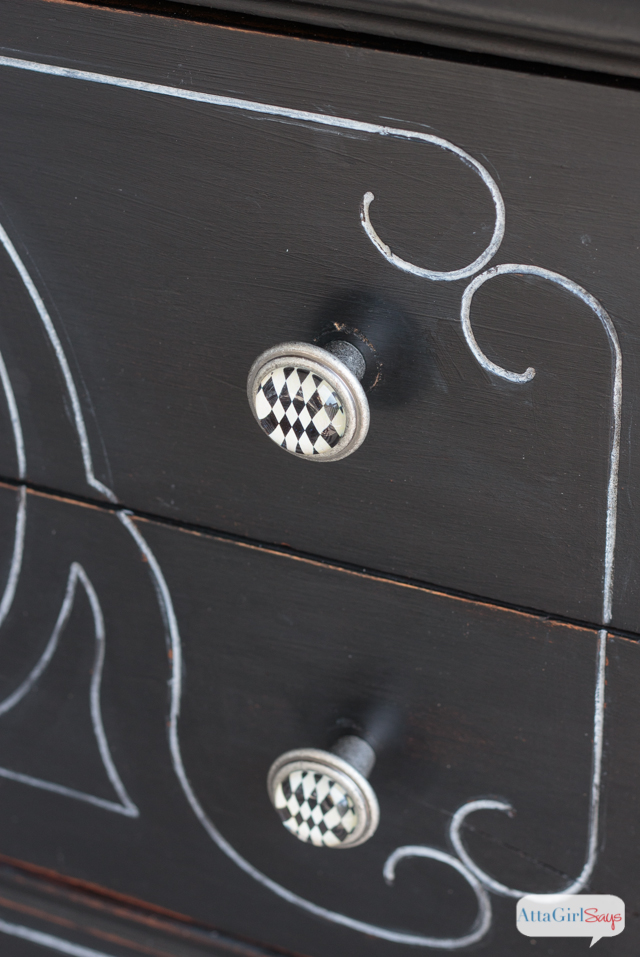 I always worry about painting furniture black because I'm afraid details will get lost. But this vintage buffet is gorgeous. I love the subtle distressing and the white highlights. It really gives new life to a battered, old piece of furniture. #sponsored #decoartprojects #chalkyfinish