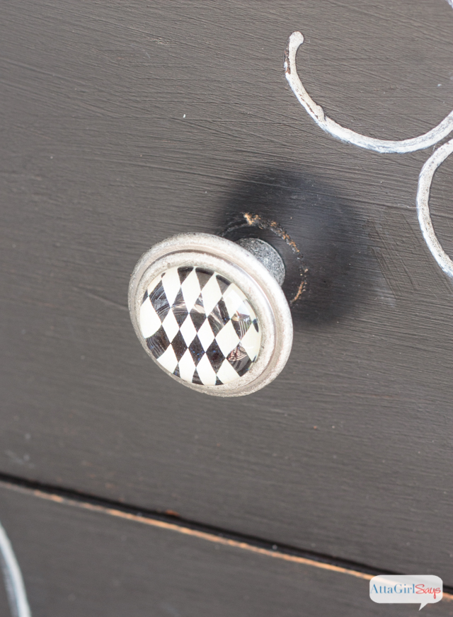 I always worry about painting furniture black because I'm afraid details will get lost. But this vintage buffet is gorgeous. I love the subtle distressing and the white highlights. It really gives new life to a battered, old piece of furniture. #sponsored #decoartprojects #chalkyfinish