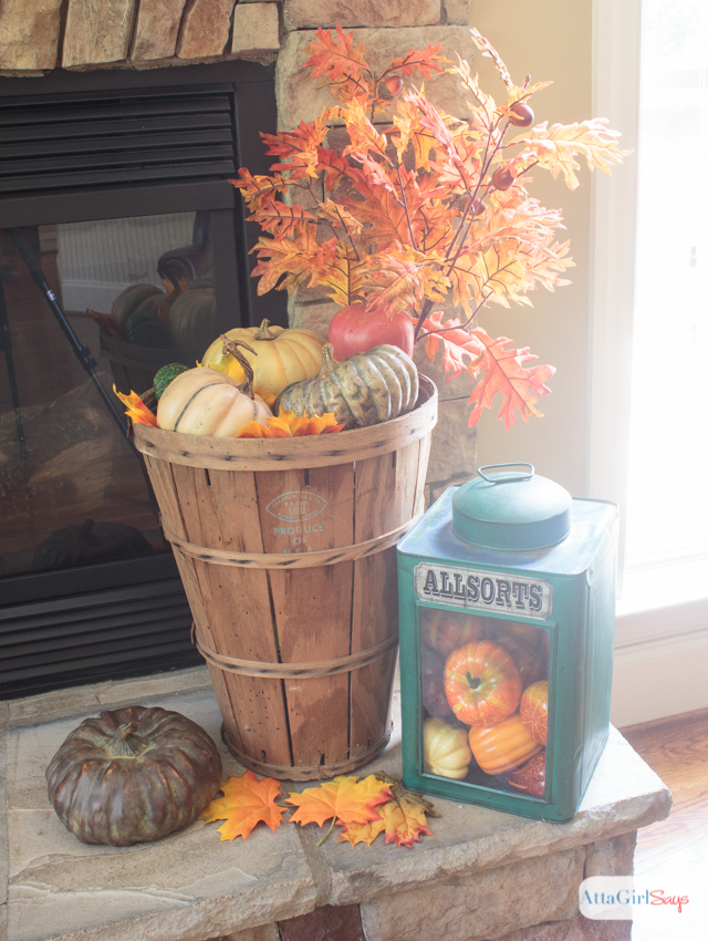 How to decorate a mantel using traditional fall colors and natural elements.
