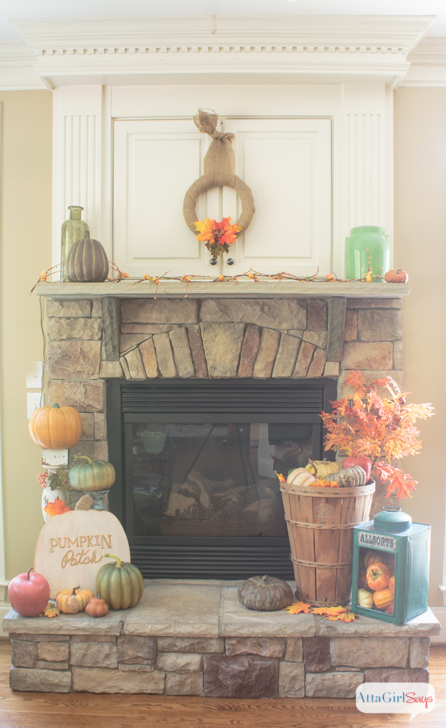 How to decorate a mantel using traditional fall colors and natural elements.