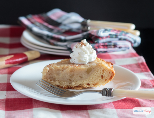 slice of homemade applesauce pie on a checkered tablecloth