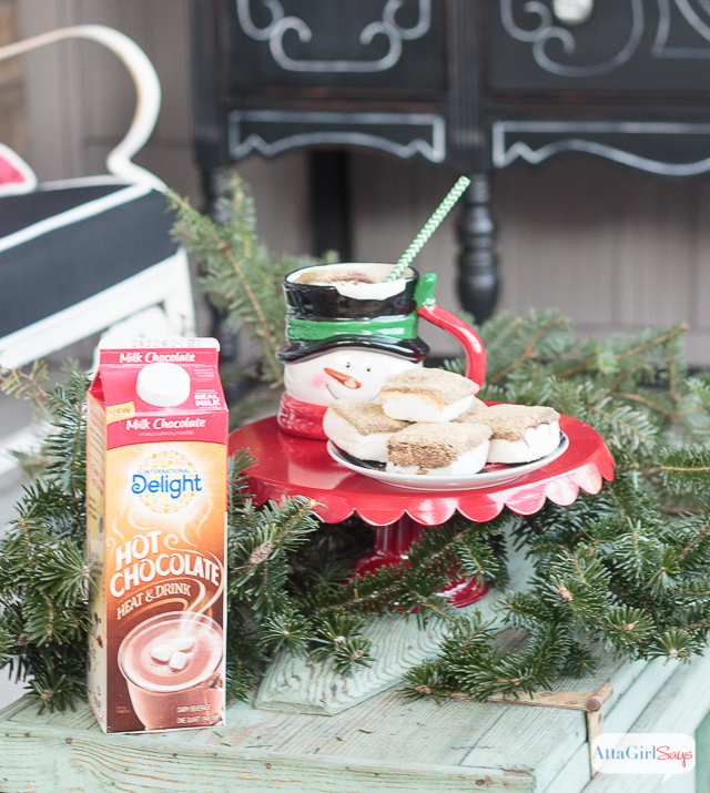 Hot chocolate and s'mores? Could it get any better? These chocolate covered marshmallows with a graham cracker topping are so easy to make. They're delicious as a snack but even better in a mug of hot chocolate. Sounds like a good excuse to throw a hot chocolate party! #ad #ShareYourDelight