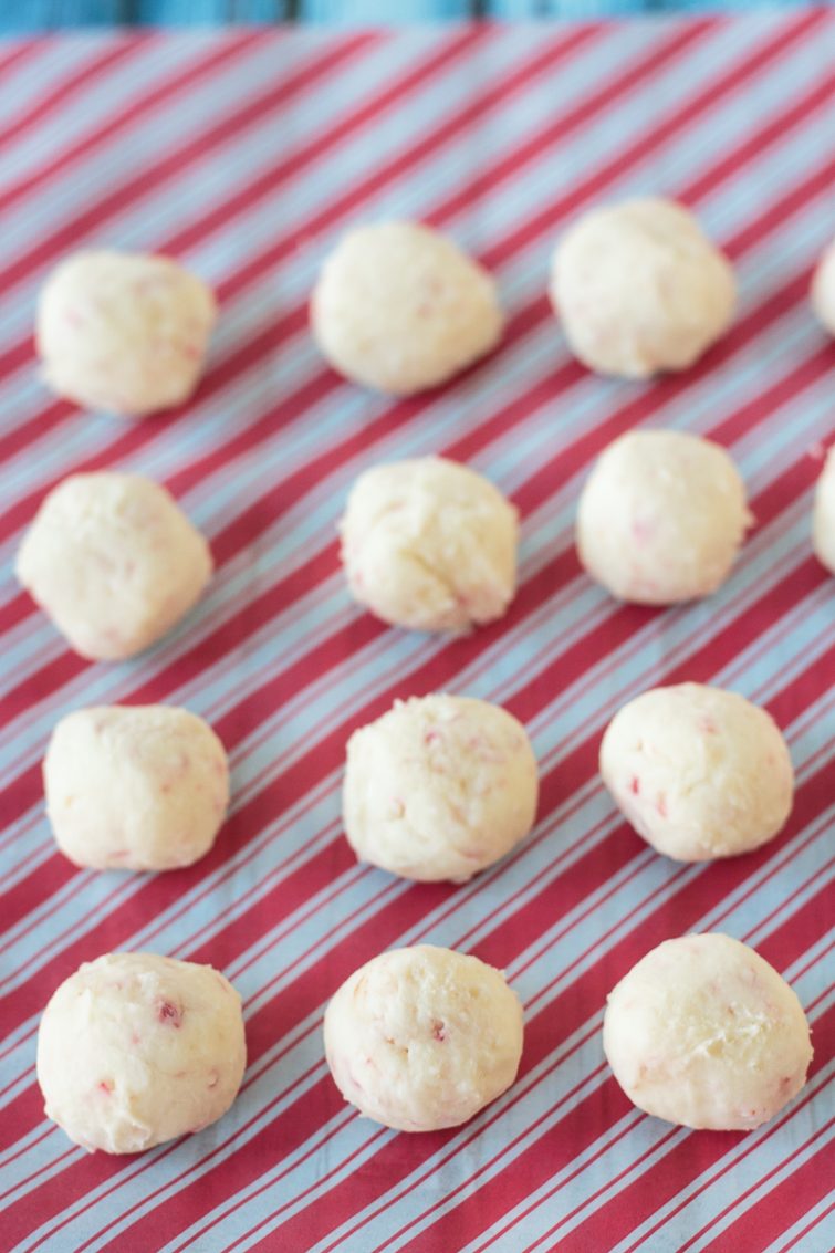 Christmas candies on a red and white parchment