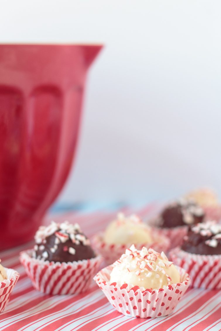 chocolate and white chocolate candies sprinkled with crushed peppermint
