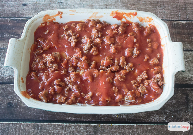 meat sauce layered over noodles and cheese to make lasagna
