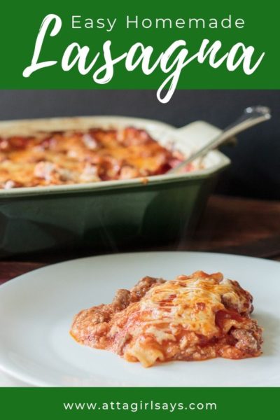 serving of lasagna on a white plate beside a casserole dish