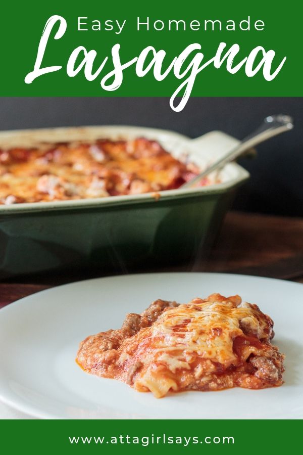 serving of lasagna on a white plate beside a casserole dish