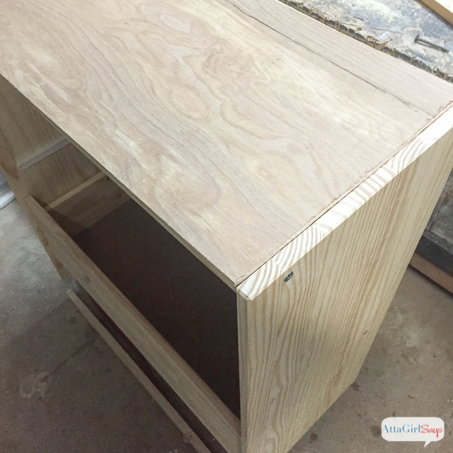To eliminate the gap on the top of the chest, I added a thin sheet of luan. You can see how the entire Ikea RAST hack transformation on Atta Girl Says. #hickoryhardware #sponsored #ikeahack