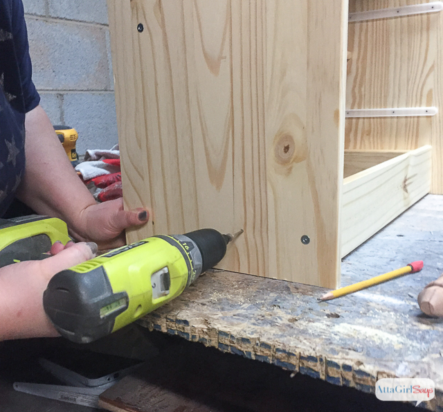 The first step in my Ikea Rast Hack was to add wood braces to the base so I could add turned legs to the simple pine chest. #hickoryhardware #sponsored #ikeahack