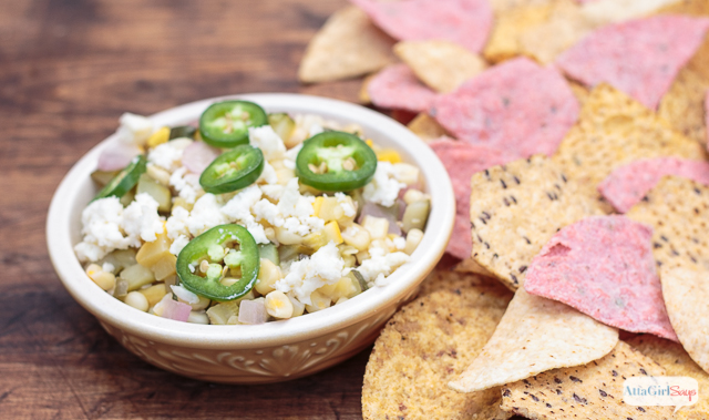 Looking for some Cinco De Mayo food to serve besides traditional salsa? Check out this garden-fresh, calabacitas-style salsa made with zucchini, corn, squash, onions and jalapenos. It's great paired with your favorite chips and Mexican beer. #foodshouldtastegood #sponsored