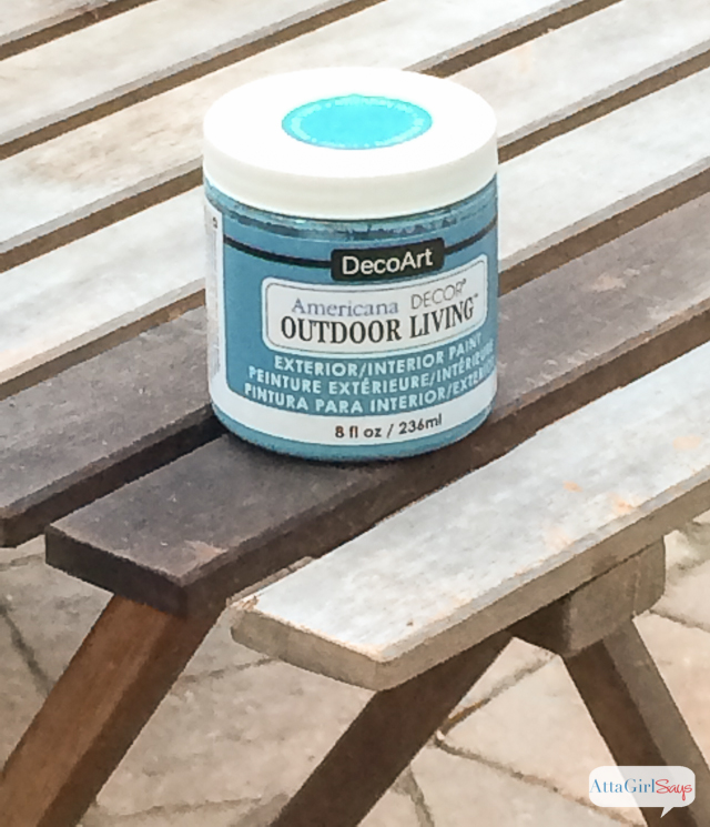 Give wooden outdoor patio furniture a makeover with paint! I love how the turquoise paint transformed this folding side table.
