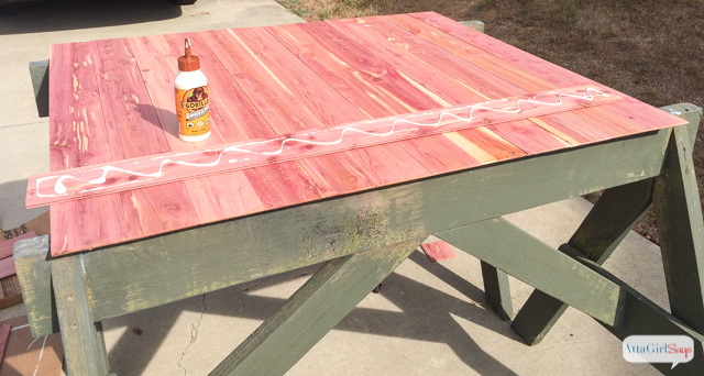 Learn how to make your own farmhouse style DIY fireplace screen using tongue-and-groove cedar paneling. Click for step-by-step instructions for this easy carpentry project. #sponsored