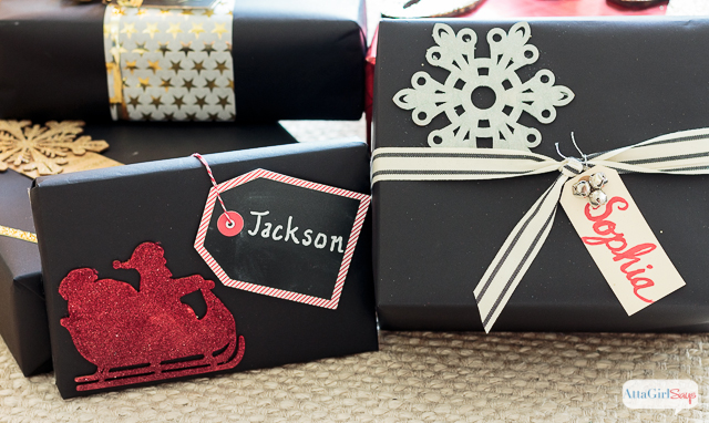 You don't need expensive paper or fancy ribbon to wrap beautiful gifts. Check out these inexpensive Christmas gift wrapping ideas, including tips for dressing up plain wrapping paper, a tutorial to make make glittery package toppers and a technique for making gift bags out of any kind of paper you have on hand. #ad #decoartprojects 