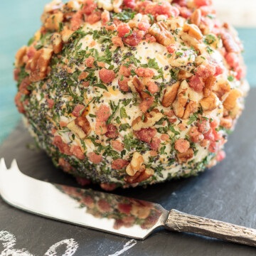 cheese ball on a slate tray