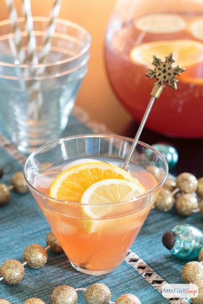This adults-only party punch recipe is spiked with bourbon and vodka. The festive combination of flavors is great for a Christmas party or a New Year's Eve celebration.