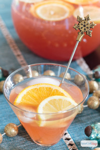 glass of spiked holiday punch on a festive table