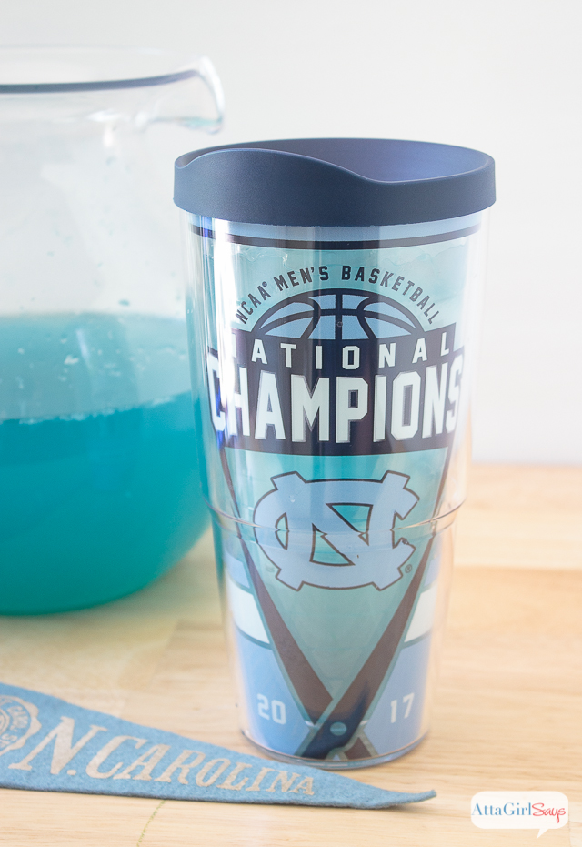 Tervis tumbler beside a pitcher of blue punch