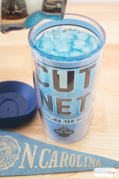 Show your team colors and celebrate the N.C. Tar Heels with two tasty Carolina blue cocktails, plus a nonalcoholic blue punch recipe. The Carolina Blue Belle features peach and citrus flavors. The easy blue punch is fruity and great for a crowd. Serve it spiked or not. #sponsored