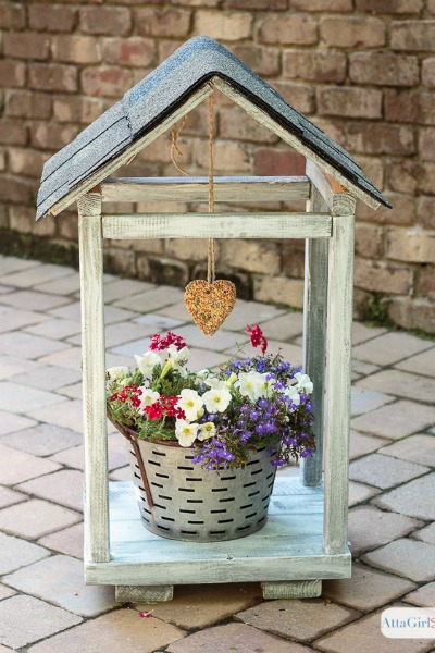 Learn how to build (and shingle the roof) of a DIY bird feeder plant atrium, using inexpensive, salvaged materials. This is a great project to do with kids. #ad #RoofedItMyself
