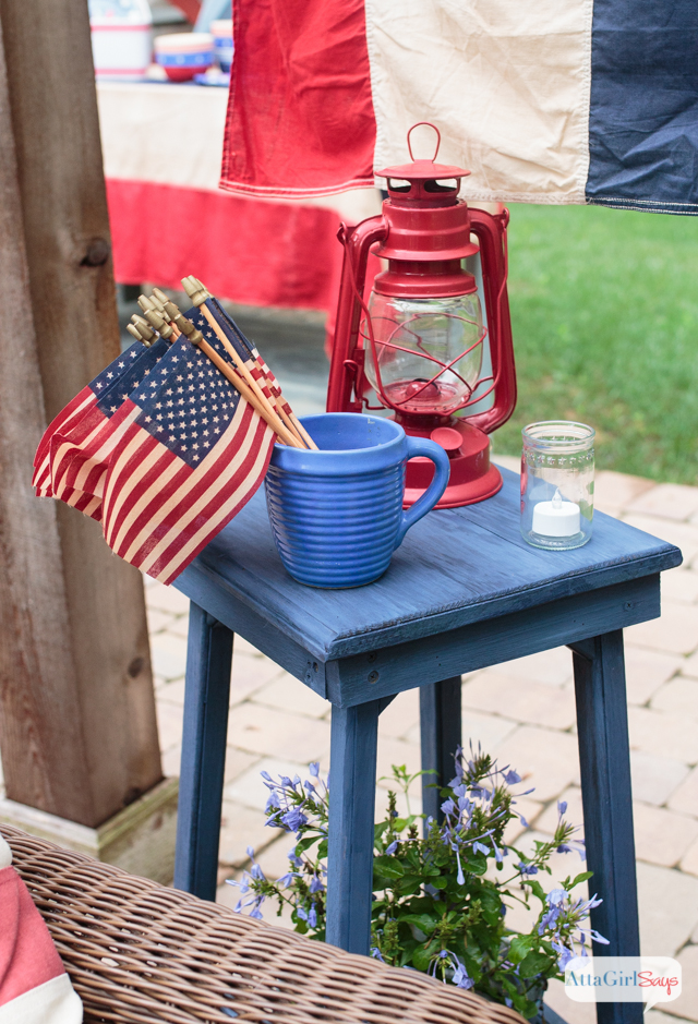 Hooray for red, white and blue! I love the use of vintage Americana decor on this patriotic patio! This would be such a fun place to host a Fourth of July party!