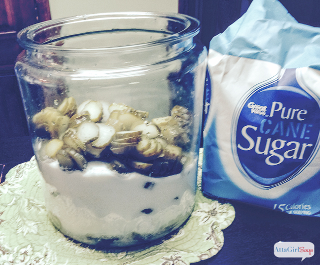pickle slices and sugar in a glass jar