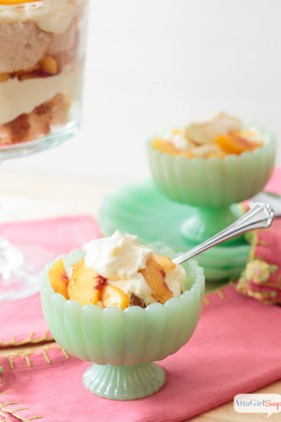 This peach trifle icebox cake, made with fresh, seasonal peaches, angel food cake and sweetened condensed milk, is the perfect summertime dessert. It's a light and airy confection, featuring vanilla, almond and peach flavors. It's an easy recipe that can be made ahead of time and kept in the refrigerator until you're ready to serve.