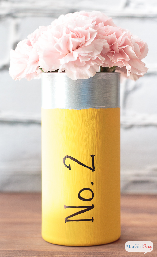 Looking for inexpensive teacher appreciation gifts. Paint a glass vase to look like a No. 2 pencil, then add a cluster of carnations as the "eraser."