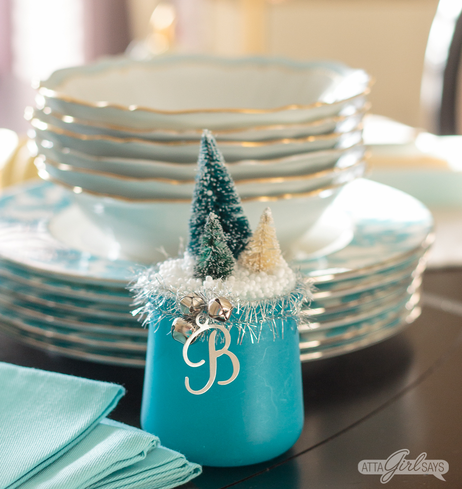 Turn glass yogurt jars into stunning sea glass and mercury glass votives. Add bottlebrush trees, greenery, tinsel and faux snow and use them as part of your Christmas decor. Click for step-by-step instructions and a complete supply list for making them. Plus check out the other ideas for repurposing jars and decorating with jars.