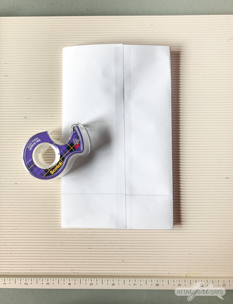 Print and make your own gardening themed party favor bags featuring artwork from vintage seed catalogs. This free collection includes lilies, tulips, daffodils, roses, hyacinths and other gorgeous spring flowers. Download all 22 designs, print them out using your &nbsp;home computer and learn step-by-step how to fold them into bags with this easy tutorial at AttaGirlSays.com. There's even a video demonstration. #springflowers #partyfavors #papercrafts #seedcatalogs #vintageflorals