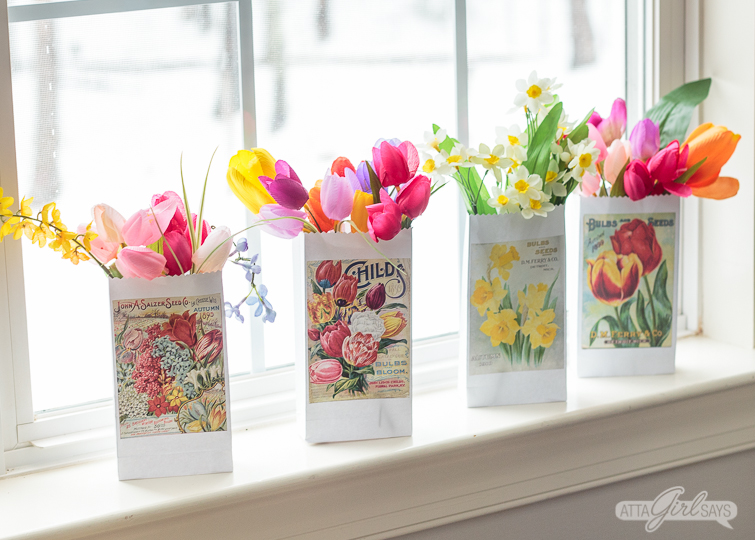 Print and make your own gardening themed party favor bags featuring artwork from vintage seed catalogs. This free collection includes lilies, tulips, daffodils, roses, hyacinths and other gorgeous spring flowers. Download all 22 designs, print them out using your &nbsp;home computer and learn step-by-step how to fold them into bags with this easy tutorial at AttaGirlSays.com. There's even a video demonstration. #springflowers #partyfavors #papercrafts #seedcatalogs #vintageflorals