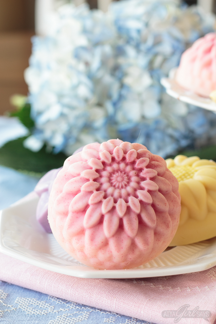 floral lotion bars with hydrangeas in the background