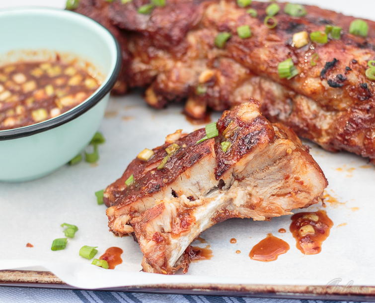 Grilled baby back ribs with an Asian sweet and spicy glaze. 